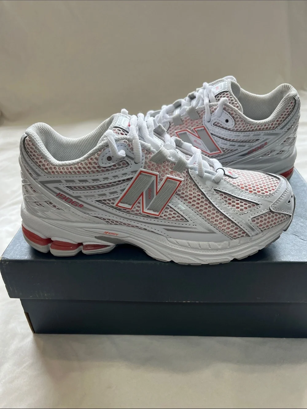 New Balance White and Light Pink Mesh Sneakers